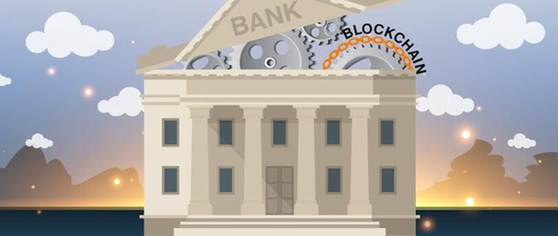 здание банка, на крыше которого написано "блокчейн"